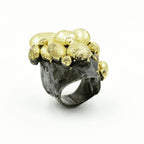 Erupting Gold on Black Ring